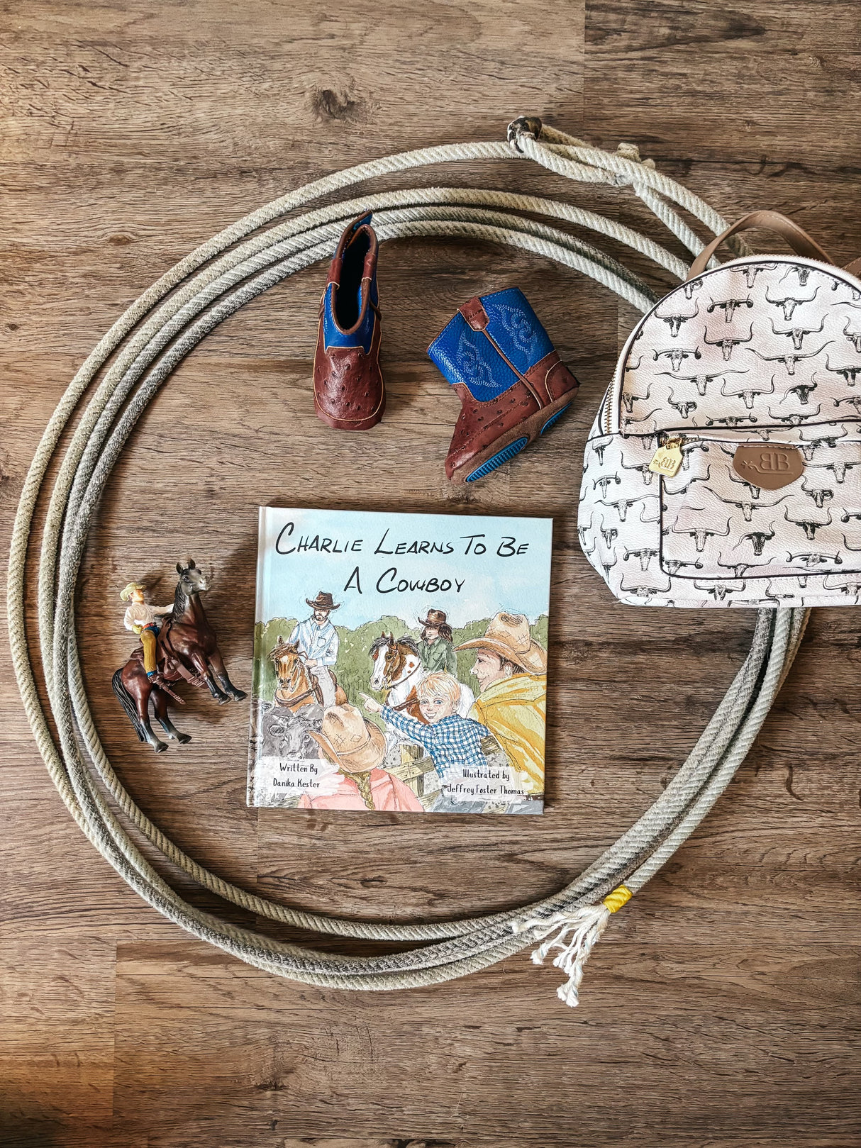 Charlie Learns to be a Cowboy Hardback Book